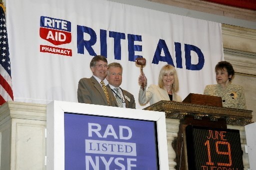 RITE AID CEO Mary Sammons, center, rings the closing bell at the New York Stock Exchange on June 19. Joining her are Karen Rugen, Kevin Twomey and NYSE Euronext president and co-COO Duncan Niederauer. / RITE AID CEO Mary Sammons, center, rings the closing bell at the New York Stock Exchange on June 19. Joining her are Karen Rugen, Kevin Twomey and NYSE Euronext president and co-COO Duncan Niederauer. /