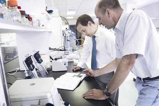 THE FUND has made many investments in successful companies including NABsys, above, where President/CEO Barrett Bready, left, is shown conferring with VP of R&D John Oliver. / THE FUND has made many investments in successful companies including NABsys, above, where President/CEO Barrett Bready, left, is shown conferring with VP of R&D John Oliver. /