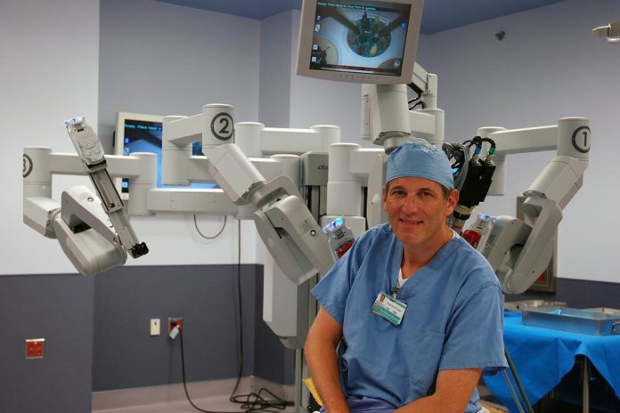 DR. HARRY C. SAX, surgeon in chief at The Miriam Hospital, had first used a surgical robot at the University of Rochester, N.Y. He pushed Miriam to bring one to Rhode Island. / DR. HARRY C. SAX, surgeon in chief at The Miriam Hospital, had first used a surgical robot at the University of Rochester, N.Y. He pushed Miriam to bring one to Rhode Island. /