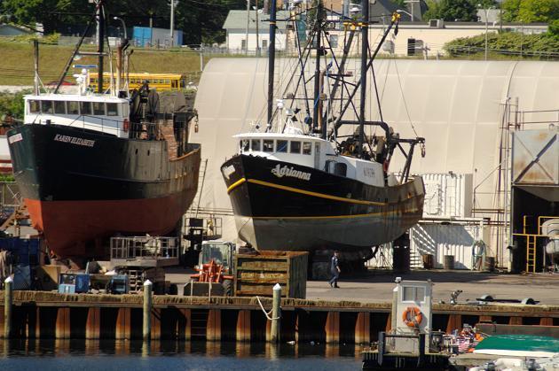 AT PROMET MARINE, a worker is dwarfed by vessels at the yard. The company is one of several along the waterfront that are concerned about proposed zoning changes. / AT PROMET MARINE, a worker is dwarfed by vessels at the yard. The company is one of several along the waterfront that are concerned about proposed zoning changes. /