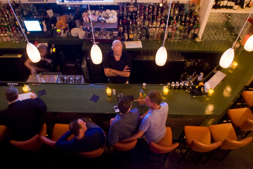 THE DOWNCITY, a longtime favorite with the local gay and lesbian community, reopened Sept. 7 at a new site, with an 

expanded menu that includes cocktails named after well-known drag queens and other local characters. / 