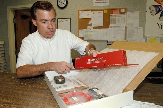 GARY DUTRA packs an order at AVTECH Software, which already has 30,000 customers in 104 countries, plus Antarctica. / GARY DUTRA packs an order at AVTECH Software, which already has 30,000 customers in 104 countries, plus Antarctica. /