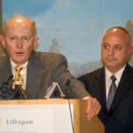 CEOs John J. Hynes, left, of Care New England and George A. Veccione of Lifespan announced the proposed merger at a joint news conference July 27. / 