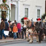 HORSE-DRAWN CARRIAGES take tourists along Benefit Street during the annual Holiday Festival, a showcase of historic houses.

 / 