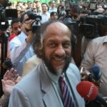 IPCC CHAIR Rajendra Pachauri speaks to reporters today in New Delhi, after learning that his U.N. panel will share the 2007 Nobel Peace Prize with Al Gore. / 