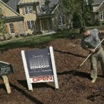 3Q SALES of single-family homes fell 2.3 percent in Rhode Island as lending-market turmoil discouraged buyers, the RIAR said. Above, Brian Johnson rakes the yard of a new house for sale in Wake Forest, N.C. / 