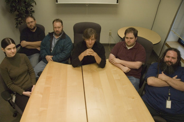 DC 401 MEMBERS fight cyber-crime by day and hack for fun by night. Gathered around a table, from left, are: Jessica Clark, Dan King, Ed Foss, John Duksta, Dennis Brown and Joe Pepin. / DC 401 MEMBERS fight cyber-crime by day and hack for fun by night. Gathered around a table, from left, are: Jessica Clark, Dan King, Ed Foss, John Duksta, Dennis Brown and Joe Pepin. /