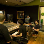 A magnet for aspiring rock stars FROM LEFT, Abe Levin, Japanese interpreter for the band BDB, works with Seth Manchester, assistant engineer at Machines with Magnets, and Keith Souza, chief engineer and producer. Band member Yoshi is in the overdub booth, and drummer Bobo is at right. /