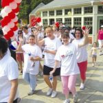 CVS reaches out to children with disabilities CVS EMPLOYEES and their families raised $50,000
for the Easter Seals earlier this year by participating in
the Walk With Me event. /