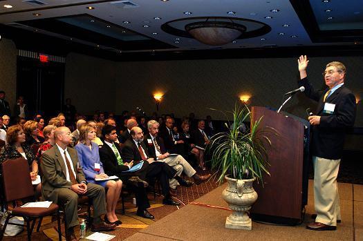 DR. ALLAN H. GOROL, right, a primary care doctor and Harvard Medical School professor, addresses local physicians and policymakers at a BCBSRI-sponsored symposium last week. / DR. ALLAN H. GOROL, right, a primary care doctor and Harvard Medical School professor, addresses local physicians and policymakers at a BCBSRI-sponsored symposium last week. /
