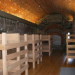 THE RESTORED military barracks can accommodate about 40 people in two large bunk rooms and a separate, smaller room for adult chaperones. / 