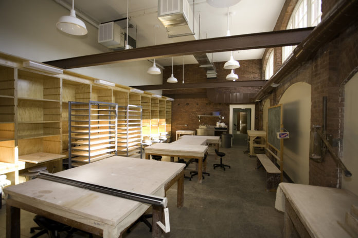 THE ORIGINAL interior in the stables area of the Victorian-era Wetmore Hall will be preserved as Salve transforms Wetmore and the adjacent Mercy Hall into an arts center. / 