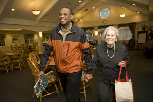 <b>MICHAEL NORDE</b> picks up his mother-in-law, Flora Scasino, at Cornerstone Adult Services last week. Day centers such as Cornerstone are crucial resources for working adults whose parents need a great deal of care and support. / <b>MICHAEL NORDE</b> picks up his mother-in-law, Flora Scasino, at Cornerstone Adult Services last week. Day centers such as Cornerstone are crucial resources for working adults whose parents need a great deal of care and support. /