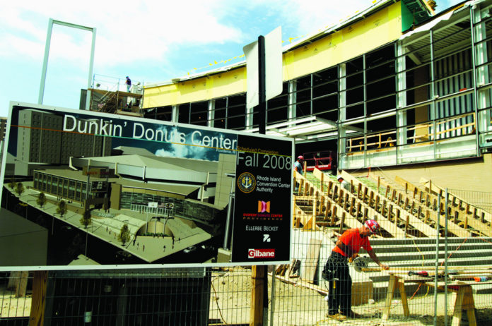 A NEW ENTRY to the still-under-construction Dunkin&rsquo; Donuts Center integrates a pedestrian bridge to the R.I. Convention Center, which event planners say makes it easier to get bookings. / 