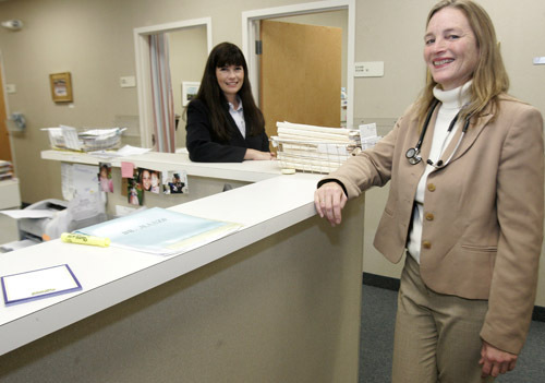 DR. ELLEN HIGHT, right, and licensed marriage family therapist Wendy Phillips – at work at University Family Medicine – both help patients in need of physical and mental care. / DR. ELLEN HIGHT, right, and licensed marriage family therapist Wendy Phillips – at work at University Family Medicine – both help patients in need of physical and mental care. /