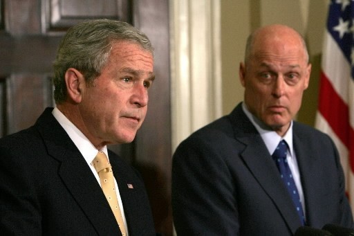 HENRY PAULSON, right, secretary of the Treasury, looks on as President George W. Bush makes his statement today in the Roosevelt Room at the White House, where they and other officials announced an agreement by lenders to freeze rates on some subprime ARMs for five years, to stem the rising tide of foreclosures. / HENRY PAULSON, right, secretary of the Treasury, looks on as President George W. Bush makes his statement today in the Roosevelt Room at the White House, where they and other officials announced an agreement by lenders to freeze rates on some subprime ARMs for five years, to stem the rising tide of foreclosures. /