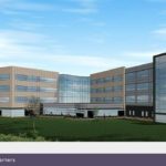 THE 340,000-square-foot, four-story building FM Global plans to open in mid-2009 is expected to be LEED-certified. Above is a rear view of the planned headquarters.  / 