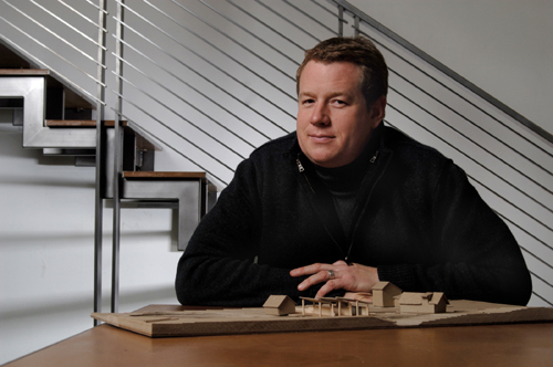LUKE MANDLE, of Two Ton Inc., used the renovations of his Pawtucket office to showcase his designing skills. Founded in 2004, the company is beginning to gain traction, Mandle said. / LUKE MANDLE, of Two Ton Inc., used the renovations of his Pawtucket office to showcase his designing skills. Founded in 2004, the company is beginning to gain traction, Mandle said. /