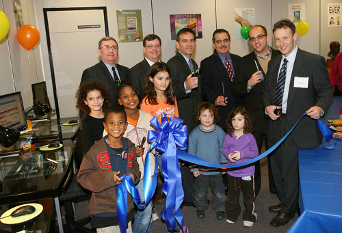 FROM LEFT: Tom Glavin, Providence City Council chief of staff; Kevin Olson, director of the Jewish Community Center of Rhode Island; Jeff Vogel, JCCRI president; Peter Mancini, City Council president; Cliff Wood, City Council member; and Michael Prescott, GTECH Corp. senior vice president and deputy general counsel, with students from the Jewish Community Center. / FROM LEFT: Tom Glavin, Providence City Council chief of staff; Kevin Olson, director of the Jewish Community Center of Rhode Island; Jeff Vogel, JCCRI president; Peter Mancini, City Council president; Cliff Wood, City Council member; and Michael Prescott, GTECH Corp. senior vice president and deputy general counsel, with students from the Jewish Community Center. /