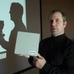 Wireless auction has local interest TOWERSTREAM CEO Jeff Thompson holds a Redline Communications device. The company is competing for parts of the valuable wireless spectrum. /