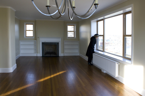 GLEAMING HARDWOOD FLOORS and functional yet stylish built-ins are highlighted in this interior view of one of the 33 spacious condos. / GLEAMING HARDWOOD FLOORS and functional yet stylish built-ins are highlighted in this interior view of one of the 33 spacious condos. /