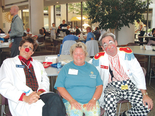 CLOWN TIME: Dr. Bounce and Nurse BB helped employee Beverly Freitas reduce stress at a recent Rhode Island Hospital/Hasbro Children’s Hospital Stress Less health fair, an event run by Lifespan for its workers. / CLOWN TIME: Dr. Bounce and Nurse BB helped employee Beverly Freitas reduce stress at a recent Rhode Island Hospital/Hasbro Children’s Hospital Stress Less health fair, an event run by Lifespan for its workers. /