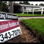 NATIONWIDE, foreclosure actions rose 8% last month, RealtyTrac said, with a total of 233,001 default notices, auction sale notices and bank repossessions reported in January. Above, a house in Eugene, Ore. / 