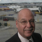 Businesses see benefits to airport expansion KEVIN A. DILLON, director of T.F. Green, says a longer runway would help attract both coast-to-coast service and nonstop service to some international markets. /