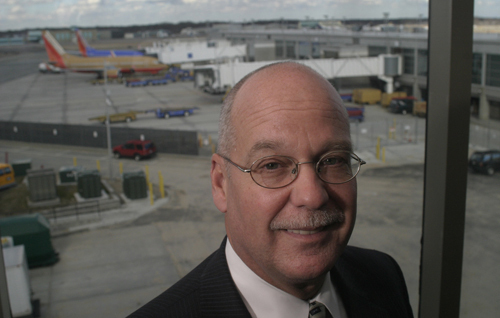 KEVIN A. DILLON, director of T.F. Green, says a longer runway would help attract both coast-to-coast service and nonstop service to some international markets. / KEVIN A. DILLON, director of T.F. Green, says a longer runway would help attract both coast-to-coast service and nonstop service to some international markets. /
