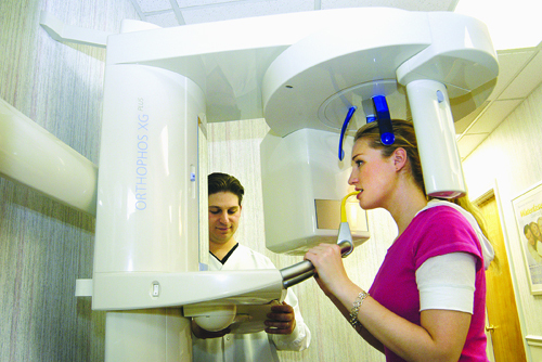 DR. JOSEPH MATRULLO demonstrates the capabilities of the digital panoramic/celphalometric x-ray machine at Matrullo Cosmetic Dentistry in Cranston. / DR. JOSEPH MATRULLO demonstrates the capabilities of the digital panoramic/celphalometric x-ray machine at Matrullo Cosmetic Dentistry in Cranston. /
