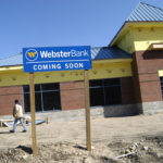 WEBSTER BANK is constructing a new branch that will open this summer in North Kingstown’s Wickford Junction. / 