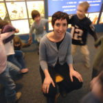 ANISA RAOOF, seated, is surrounded by kids at the Providence Children&rsquo;s Museum. Her Web site on activities for kids is averaging about 500 visitors a day. / 