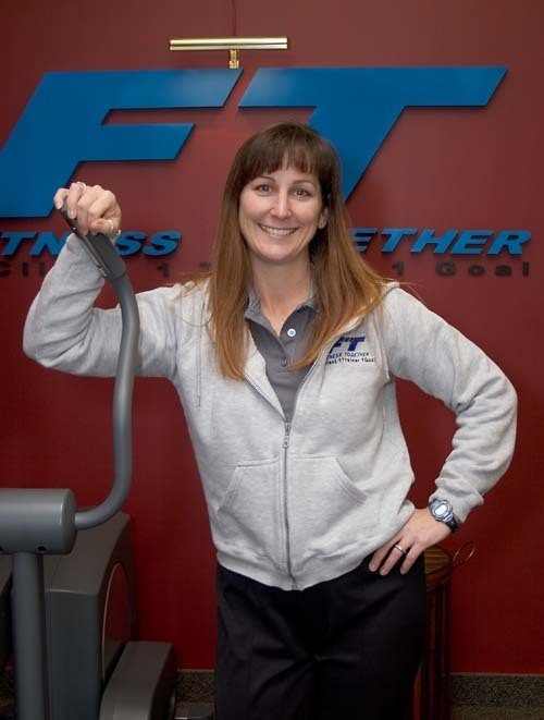 MIND, BODY AND SOUL: Lisa D. Helfrich, owner
of Fitness Together,
specializes in one-on-one training aimed at
challenging her clients to reach their full potential. / MIND, BODY AND SOUL: Lisa D. Helfrich, owner
of Fitness Together,
specializes in one-on-one training aimed at
challenging her clients to reach their full potential. /