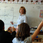 MATH TEACHER Gloria Rossiter instructs students at Aldrich Junior High in Warwick last week. Students at schools such as Aldrich are beginning to receive financial education to prepare them for adulthood. / 
