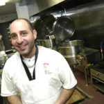Oakland Beach eateries ready for summer crowd OWNER DAVID GRAVINO, in the expanded kitchen of Iggy’s Doughboys and Chowder House, at Oakland Beach in Warwick. /