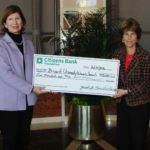FROM LEFT: Kati Machtley, chair of The Women’s Summit, receives a donation to the Women’s Summit from Gail Ginnetty, Citizens Bank senior vice president, director of investment management services for Rhode Island and Connecticut. / 