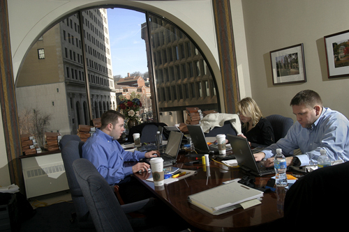SASLOW LUFKIN & BUGGY certified public accountants Dan Connelly, Urszula
Skarzynski and Eric Piurkowski conduct an audit in the Turks Head Building, in the
second-floor office of a building tenant. / SASLOW LUFKIN & BUGGY certified public accountants Dan Connelly, Urszula
Skarzynski and Eric Piurkowski conduct an audit in the Turks Head Building, in the
second-floor office of a building tenant. /
