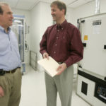 Medical devices breathe new life into manufacturer CONCORDIA MEDICAL’S president/CEO, Randal W. Spencer, left, and EVP, Art Burghouwt, talk while at the company’s Coventry facility. The company is adding a Warwick location. /