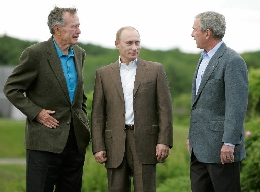 GEORGE H.W. BUSH, left, will speak at the Bryant Commencement next month, receiving an honorary degree. Visiting the former president last summer in Kennebunkport, Maine, are Russian President Vladimir Putin, center, and President George W. Bush. / GEORGE H.W. BUSH, left, will speak at the Bryant Commencement next month, receiving an honorary degree. Visiting the former president last summer in Kennebunkport, Maine, are Russian President Vladimir Putin, center, and President George W. Bush. /