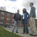 Group’s effort to protect mill tenants paying off LISA CARNEVALE, center, and Erik Bright, right, speak with Struever Bros. Eccles & Rouse’s Eric Bush at the firm’s American Locomotive Works development. /