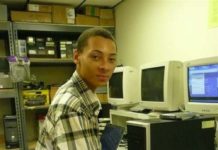 INTERN CHRIS LAWSON is leading a project at PC Troubleshooters Inc. to refurbish and donate 14 computers to charity. / 