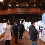 ATTENDEES OF the Northeast Biotechnology Conference, held at Brown University April 4 to 6, peruse poster board displays in Sayles Hall. / 