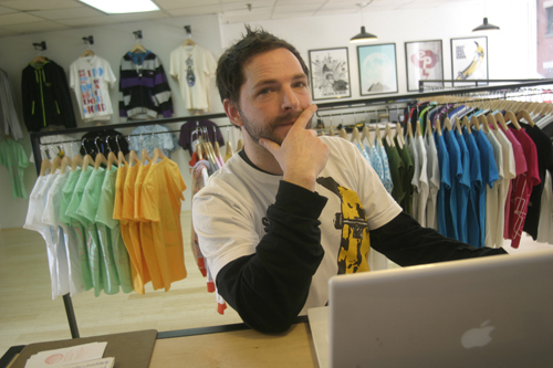 NEW DIGS: Grandison Taber, owner of Grandbüro Design on Eddy Street in downtown Providence, is one of 20 retail tenants who moved into the heart of the city in the past 16 months. / NEW DIGS: Grandison Taber, owner of Grandbüro Design on Eddy Street in downtown Providence, is one of 20 retail tenants who moved into the heart of the city in the past 16 months. /