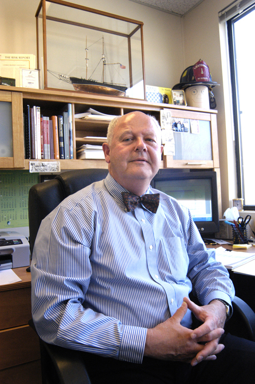 WILLIAM K. AUSTIN, principal at Austin & Stanovich Insurance, in his Providence office. / WILLIAM K. AUSTIN, principal at Austin & Stanovich Insurance, in his Providence office. /