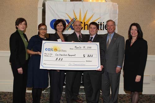 PAUL CRONIN, center, senior vice president and general manager for Cox Communications in New England, and Lt. Gov. Elizabeth Roberts, far right, join representatives of the YMCA of Greater Providence to celebrate their award. / PAUL CRONIN, center, senior vice president and general manager for Cox Communications in New England, and Lt. Gov. Elizabeth Roberts, far right, join representatives of the YMCA of Greater Providence to celebrate their award. /