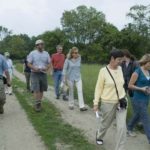 A market approach to saving state’s wildlife A GROUP WALKS Watson Farm in Jamestown, one of the farms participating in the
University of Rhode Island’s ecological investment project. /