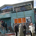 A GROUP OF Providence residents tour the former Shooters nightclub near India Point Park. A proposal would rezone the site for public space. / 