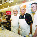 A 50-year tradition lives on at Wayland Square from left, Peter, Michael and Shane Rufful work behind the counter at the family-owned diner, one of the oldest businesses in the neighborhood. /
