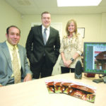 A new magazine for Rhode Island’s condo dwellers RICHARD A. PARIS, left, and Douglas P. Guilbert co-founded Condo Owner Monthly, with hopes of reaching 30,000 condominium owners. At right is sales manager Tara Dainef. /