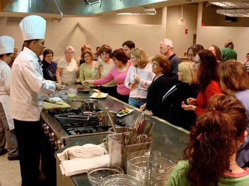 SHAPE UP RI programs go beyond exercise to include free workshops, such as this cooking demonstration with Rhode Island chef Frank Terranova. / SHAPE UP RI programs go beyond exercise to include free workshops, such as this cooking demonstration with Rhode Island chef Frank Terranova. /